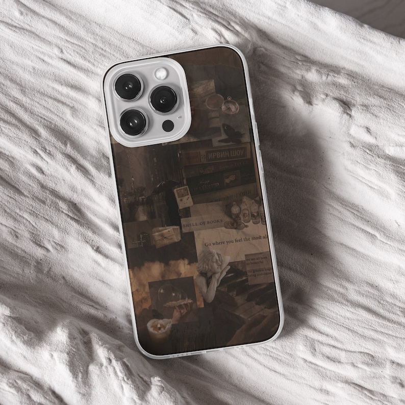 iPhone 15 Pro Max 14 Plus 13 12 11 clear case with Dark academia design on it, there are total of five phone cover options to choose from. Gothic, book lover, darkcore, castle, dark aesthetic, clouds and old aesthetic artwork depicted.