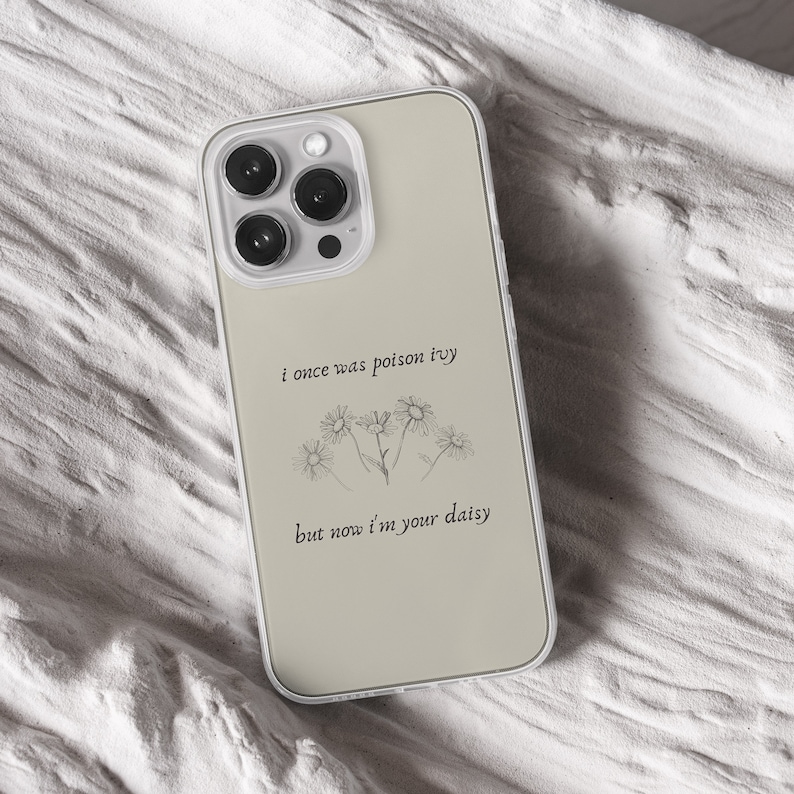 iPhone 15 Pro Max 14 Plus 13 12 11 clear case with Taylor Swift aesthetic design on it, there are total of five phone cover options to choose from. Music Song lyrics, Midnights, Folklore, pastel, evermore, 1989 cover artworks are depicted.