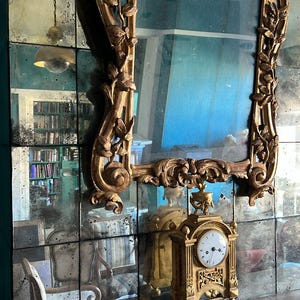 Distressed mirror tiles