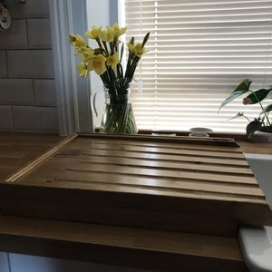 Large Raised Solid Pine draining board for a belfast/butler sink that is raised above the worktop