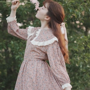 victorian dress, cottage core dress, button up till waist. lace on the collar and sleeves. floral print. elongated modest.
