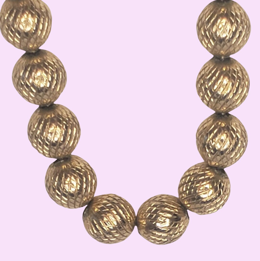 Vintage Trifari Crown Gold Metal Beads Single Strand Necklace From the