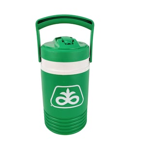 May include: Green and white insulated water jug with a green handle. The jug features a white band around the middle and a white logo on the front. The jug is designed to keep beverages cold. The handle is approximately 8 inches long.