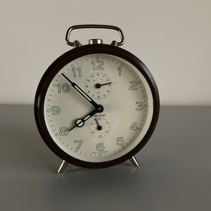 Vintage brown alarm clock from the 1970s by the Velona brand