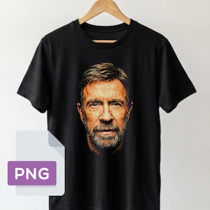 Könnte beinhalten: Ein schwarzes Kurzarm-T-Shirt mit einem zentrierten, realistischen Farbporträt eines Mannes mit kurzem braunem Haar und Bart. Der Grafikdruck zeigt detaillierte Gesichtszüge, einschließlich Augen, Nase und Mund, auf dem einfarbigen schwarzen Stoff.