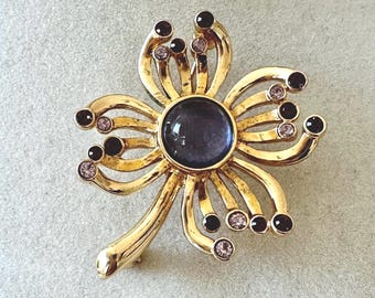 Vintage Gold Tone Floral Brooch with Purplish-Blue Cabochon Unsigned