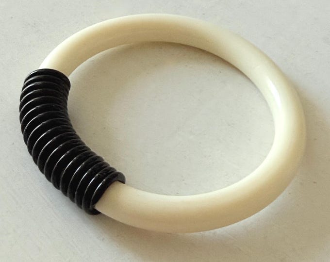 Vintage Cream Acrylic Bangle Bracelet with Black Acrylic Cord Accent Unsigned
