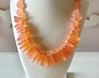 Vintage Avon Mark. Rock of Ages Peach Acrylic Necklace
