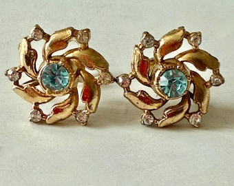 Vintage Gold Tone Swirling Earrings with Aqua Rhinestone Center Unsigned