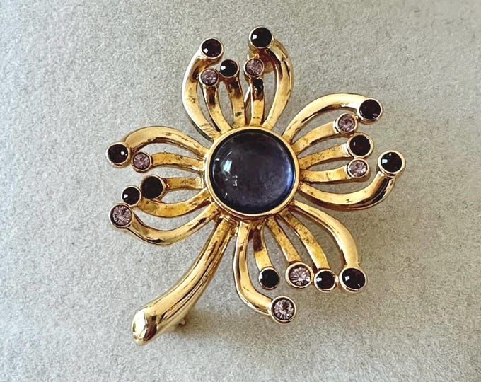 Vintage Gold Tone Floral Brooch with Purplish-Blue Cabochon Unsigned