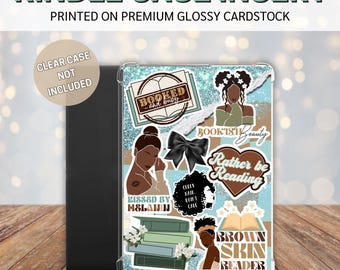 May include: A clear plastic case insert for a Kindle e-reader with a blue glitter background. The insert features several colorful stickers with text such as "Booked and Busy", "Bookish Beauty", "Rather be Reading", "Kissed by Melanin", "Curly Hair Don't Care", and "Brown Skin Reader".