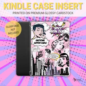 May include: A pink and black Kindle case insert with a comic book style design. The design features a cityscape, a woman crying, and the text "Emotional Support Kindle", "Spicy Book Club", and "Honestly, I'd rather be reading".