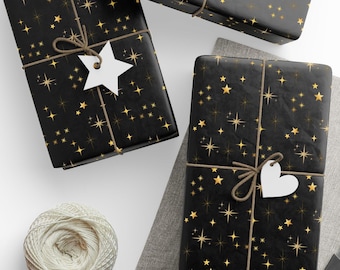 Papel de regalo con estrellas navideñas: Papel de regalo celestial negro y dorado