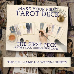 May include: A game set titled Make Your First Tarot Deck The First Deck A Cozy Solo Journaling Game. The image shows a fan of illustrated cards, a teacup, a candle, and a hand drawing on a card. Includes the text The Full Game + 16 Writing Sheets.