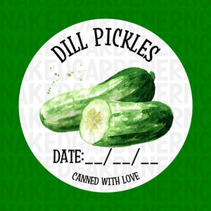 May include: A white circle label with the text "DILL PICKLES" in black lettering. The label also includes the text "DATE:__/__/__" and "CANNED WITH LOVE".  Two green dill pickles are pictured on the label.