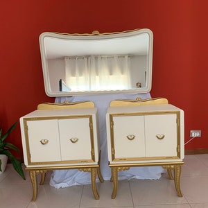 Pair of bedside tables and baroque style mirror