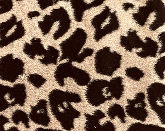 Animal print leopard style great fabrics for evening dress  jacket over coat upholstery pillows made in Scotland