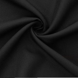 Designer Italian super quality jet black wool gabardine by DKNY  great fabrics for evening dress jacket suit made in iatly