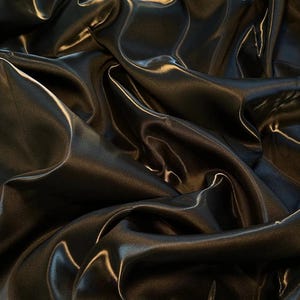 Peut inclure: Gros plan sur un tissu satin noir avec des plis fluides et un éclat brillant. Le tissu reflète la lumière, créant des reflets et des ombres sur sa surface. Le matériau semble doux et luxueux, adapté à l'habillement ou à la décoration intérieure.