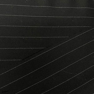 100% wool suiting black with white stripes design by oscar de la renta collection  great fabrics for suit pants jacket skirt made in Italy