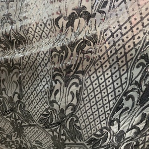 Gray shinny 4 way stretch sequins lace great fabrics for prom dress table cover and much more made in France