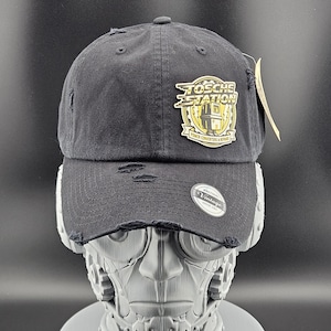 May include: A set of three ceramic mugs with a speckled, matte finish. The mugs are in shades of cream, light gray, and dark gray. Each mug has a simple, minimalist design and a rounded handle.