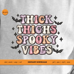 May include: A light gray fabric with the embroidered phrase "THICK THIGHS SPOOKY VIBES" in a retro font, surrounded by bats and stars. The design is a Halloween theme.