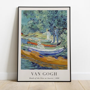 Pode incluir: Impressão artística emoldurada de "Bank of the Oise at Auvers" de Van Gogh, de 1890. A pintura mostra barcos num rio com figuras, num estilo impressionista. A obra de arte está emoldurada.