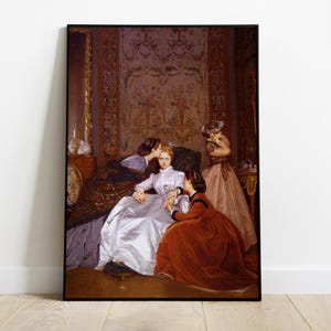 May include: Framed artwork showing a scene with four women in historical dress. One woman in a white gown is seated, with others around her, one kissing her cheek. The artwork is in a black frame.