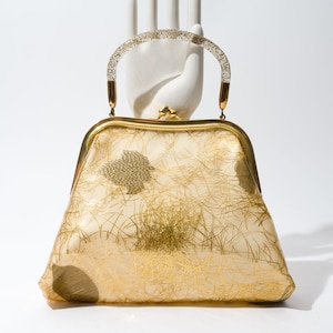 Bolso vintage de color dorado, detalle de hojas, asa de metacrilato, Eli Rosenberg, Miami