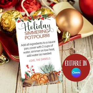 May include: Printable gift tag with a festive design featuring cinnamon sticks, oranges, and greenery. The text reads "Holiday Simmering Potpourri" and includes instructions for making the potpourri. The tag also includes the text "Love, The Daniels" and "Editable in Canva".
