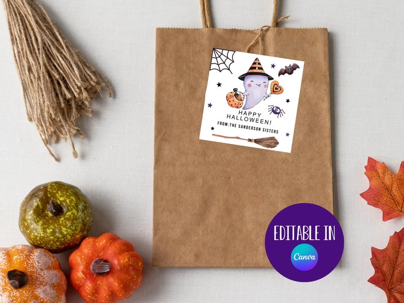 May include: A printable Halloween gift tag featuring a cartoon ghost wearing a witch hat and holding a heart. The tag says "Happy Halloween! From the Sanderson Sisters".