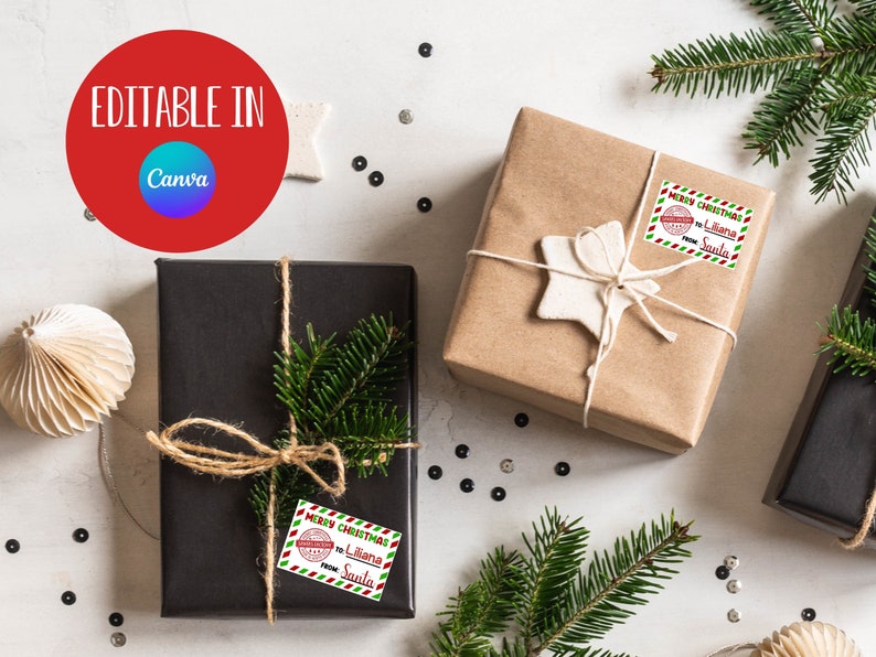 May include: Two brown gift boxes wrapped with twine and decorated with a white star and green pine branches. Each box has a red and green Christmas gift tag with the text "Merry Christmas to Liliana from Santa".