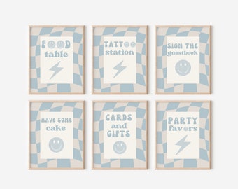 May include: Six light blue and white checkered signs with black text and graphics. The signs read "Food Table", "Tattoo Station", "Sign the Guestbook", "Have Some Cake", "Cards and Gifts", and "Party Favors".