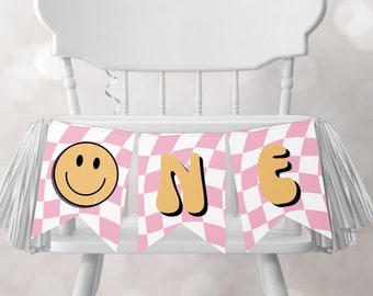 Könnte beinhalten: Rosa-weiße karierte Hochstuhl-Girlande mit dem Wort "ONE" in Gelb und einem Smiley.