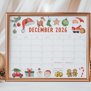 May include: A framed Christmas-themed calendar for December 2026, featuring festive illustrations. The calendar includes images of Santa, reindeer, ornaments, and a car carrying a Christmas tree. The calendar is in a gold frame.