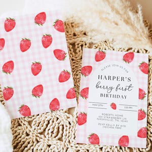 May include: A pink and white gingham patterned invitation with a watercolor strawberry design. The invitation reads "Please join us for Harper's berry first birthday, May 27th, 5:30 PM, Roberts Home, 125 Strawberry Ln, Nashville, TN, 12345, RSVP Kelly by 6/10, (123)456-7890".