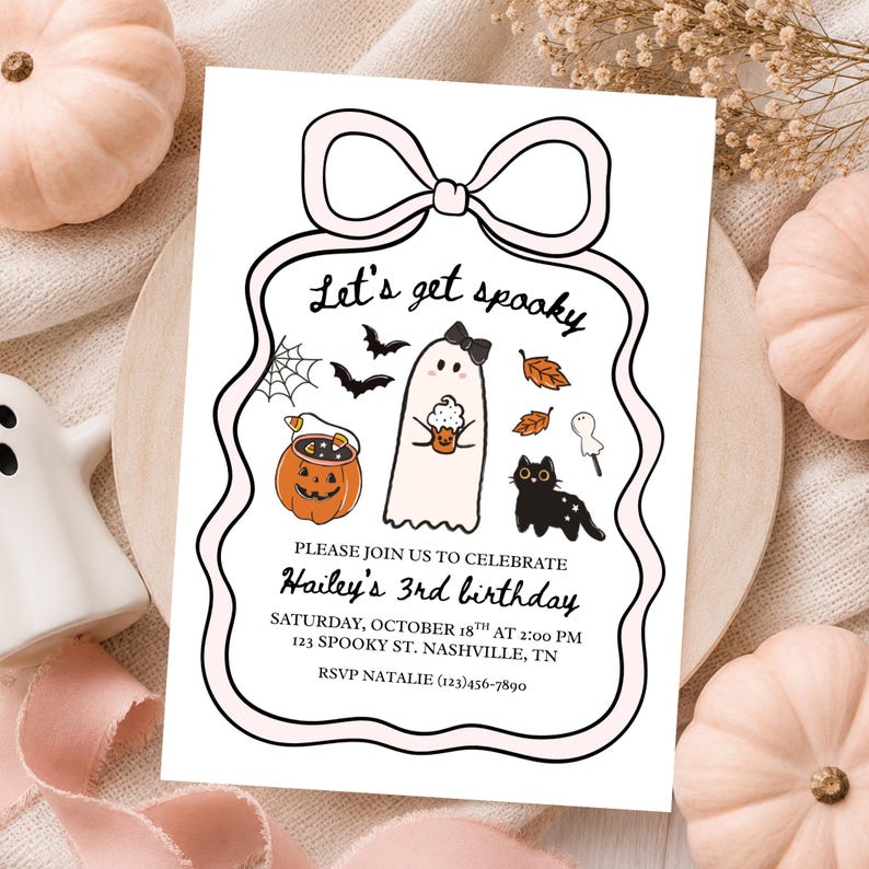 May include: A white invitation card with a pink bow design and the text "Let's get spooky." The card features Halloween-themed illustrations, including a ghost, bats, and a black cat. The invitation is for Hailey's 3rd birthday.