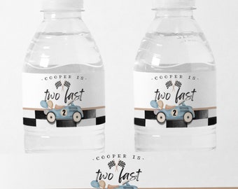 May include: Water bottle labels with a blue race car and checkered flag design. The text on the label reads "Cooper is two fast".