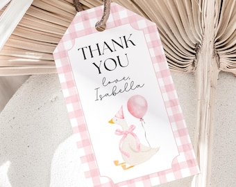 May include: A pink and white gingham gift tag with the words "THANK YOU love, Isabella" in black script. A watercolor illustration of a goose wearing a party hat and holding a balloon is on the tag.