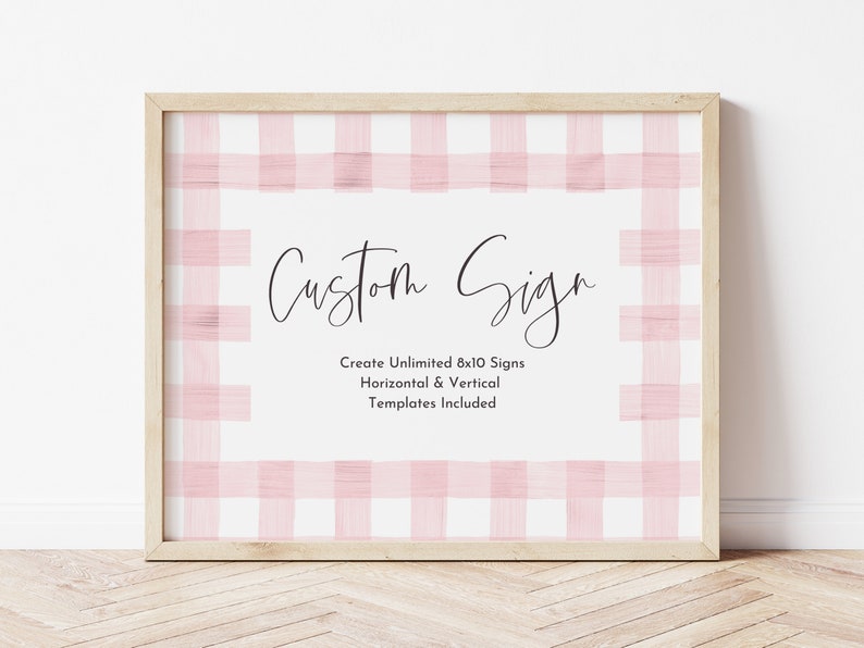 May include: A framed 8x10 inch sign with a pink and white gingham pattern. The text "Custom Sign" is written in black cursive script. The text "Create Unlimited 8x10 Signs Horizontal & Vertical Templates Included" is written in black sans-serif font.