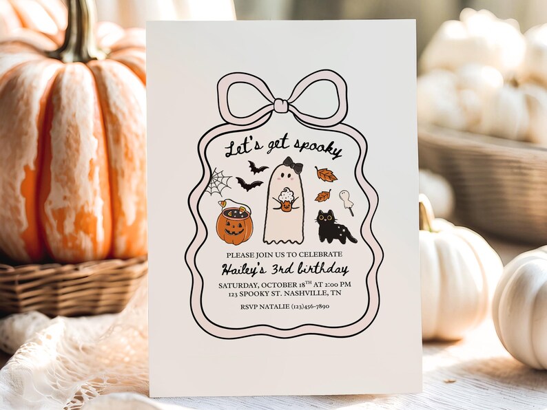 May include: A Halloween-themed invitation with a pink border and bow. The text "Let's get spooky" is at the top. The invitation includes a ghost, black cat, pumpkin, and bats. The invitation is for Hailey's 3rd birthday.
