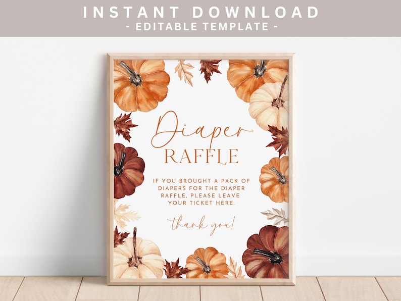 May include: A framed sign with a watercolor design for a diaper raffle. The sign features orange, white, and brown pumpkins and leaves around the border. Text on the sign reads "Diaper Raffle" and instructions for the raffle.