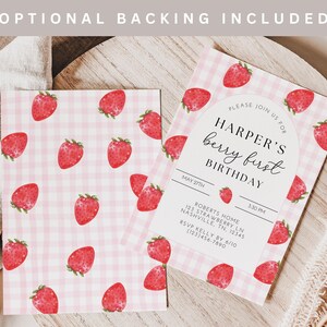 May include: A pink and white gingham patterned invitation with a watercolor strawberry design. The invitation text reads "Please join us for Harper's berry first birthday, May 27th, 3:30 PM, Roberts Home, 123 Strawberry Ln, Nashville, TN. 12345, RSVP Kelly by 6/10 (123)456-7890".