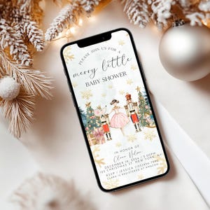 May include: A digital invitation for a baby shower with a Christmas theme. The invitation features a Nutcracker and a mouse dancing in front of a Christmas tree. The text on the invitation reads "Please join us for a merry little baby shower" and includes the date, time, and location of the event.