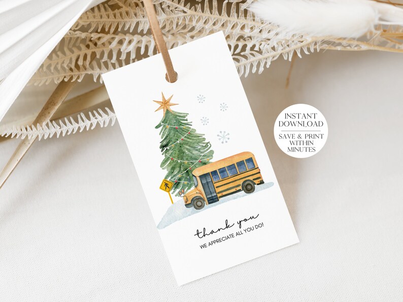 May include: A printable thank you tag featuring a watercolor illustration of a yellow school bus carrying a Christmas tree. The tag has the text "thank you" and "We appreciate all you do!"  The tag also includes the text "Instant Download Save & Print Within Minutes".