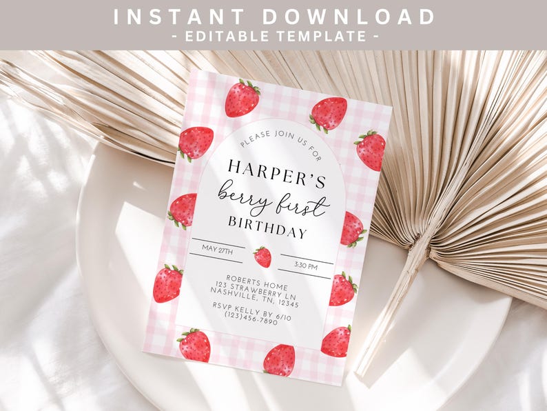 May include: A pink and white gingham patterned printable birthday invitation with a white circle containing the text "Harper's berry first birthday" and the date "May 27th". The invitation is decorated with red watercolor strawberries.