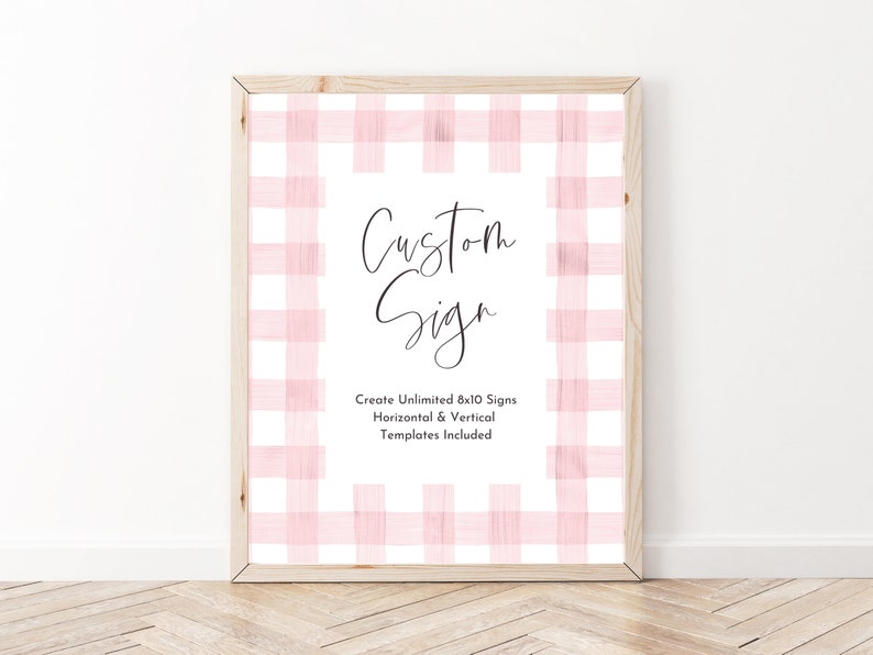 May include: A framed printable sign with a pink and white gingham pattern. The sign says "Custom Sign" and "Create Unlimited 8x10 Signs Horizontal & Vertical Templates Included".