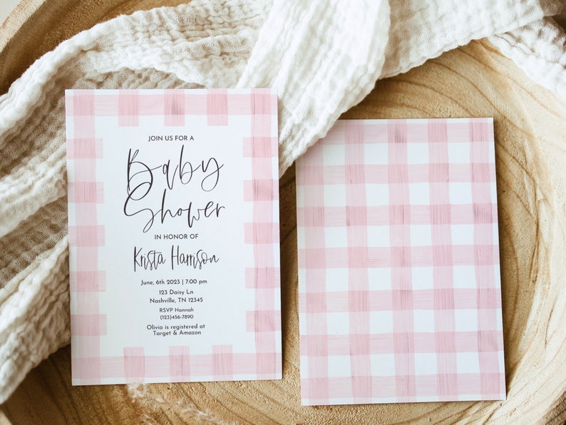 May include: Pink and white gingham baby shower invitation with the text "Join us for a baby shower in honor of Krista Harrison" and details for the event.