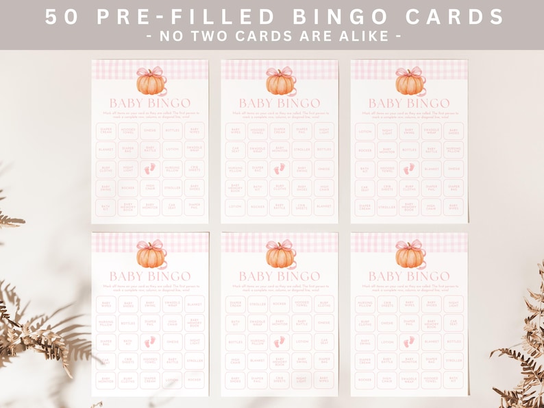 May include: Six pre-filled baby bingo cards. Each card features a pumpkin graphic with a bow and the words "Baby Bingo". The cards have a pink gingham top border and a grid of squares with baby-themed words.